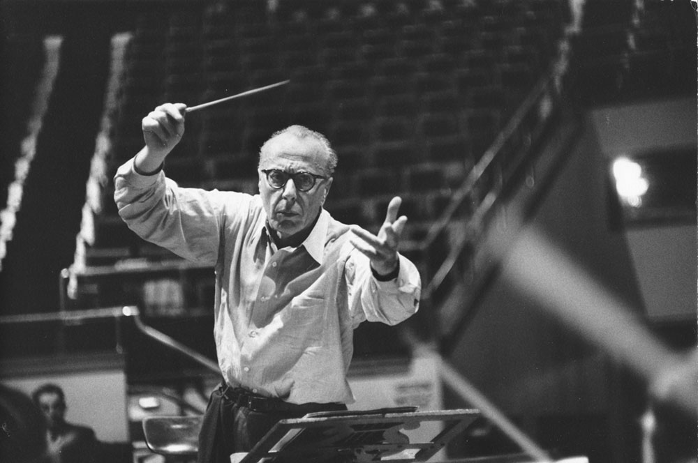 George Szell in a dramatic pose as he conducts the Orchestra.
