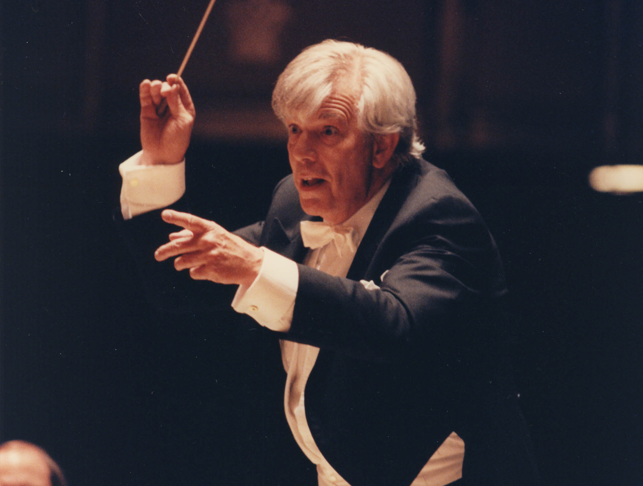 Christoph von Dohnányi is conducting. He is very animated, and almost smiling.