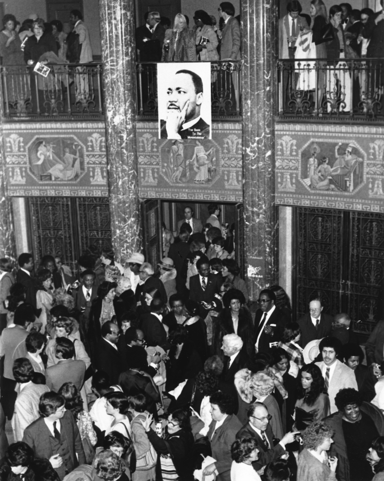 A portrait of Martin Luther King, Jr. hangs in the foyer of Severance Hall for the inaugural 1980 concert