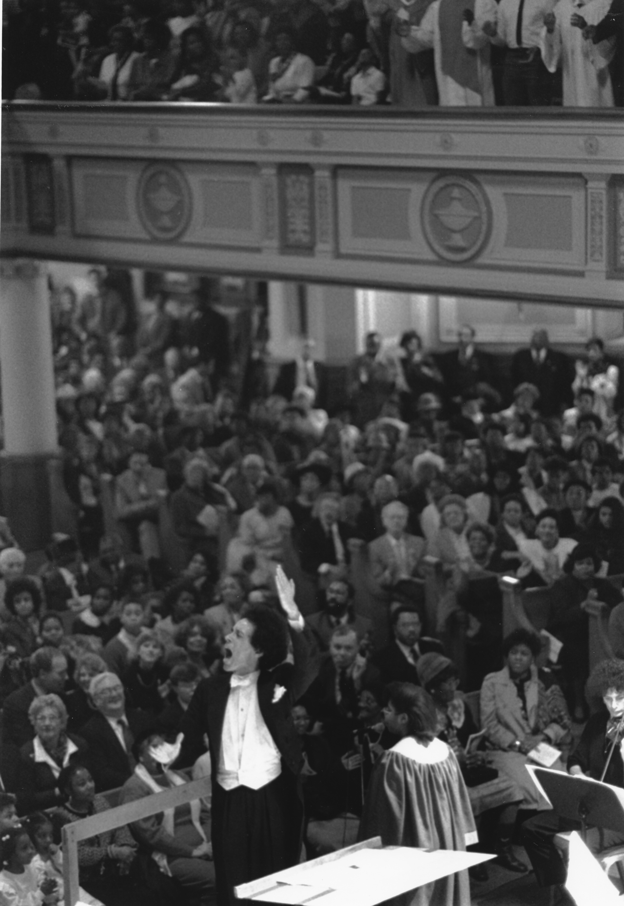 Guest conductor Isaiah Jackson leads The Cleveland Orchestra and Cleveland Community Gospel Chorus during an MLK Concert at Cory Church in 1990