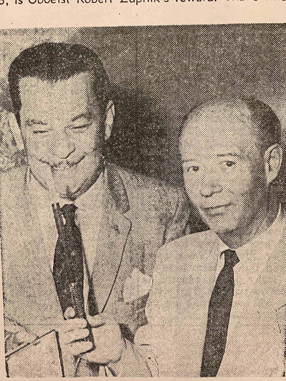 Wagner’s jeweled baton is presented to Concertmaster Josef Gingold by Editor Louis B. Seltzer of The Cleveland Press.